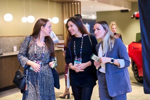 Attendees in the hotel foyer